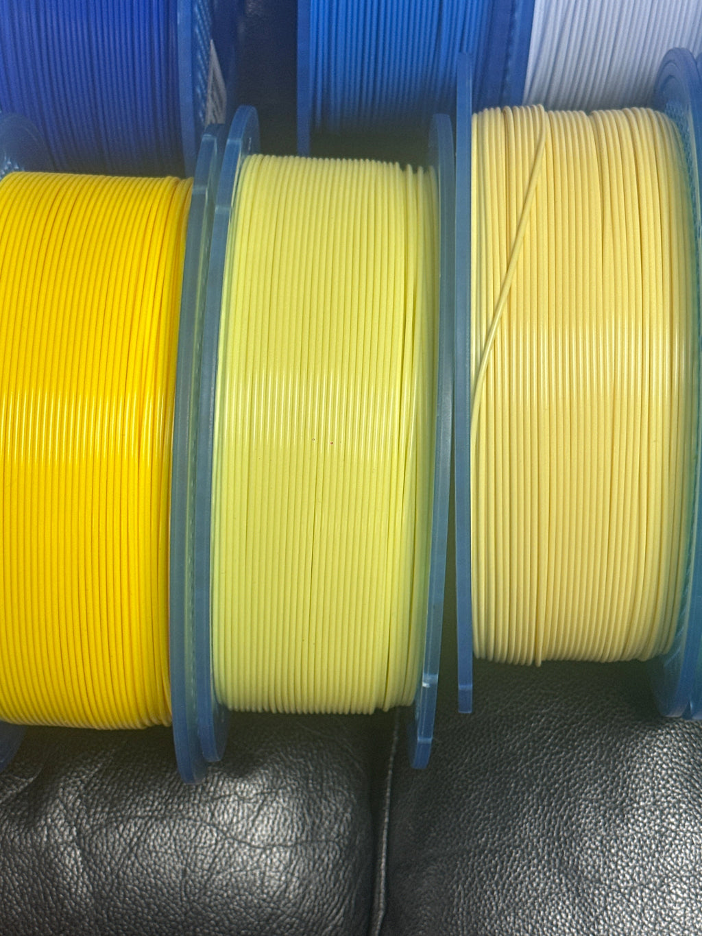 Siddament Light Yellow PETG filament spool photographed with product label